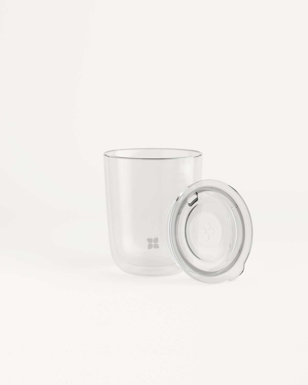 Glass Cup Set with a double-walled design and a comfortable Sip Lid, ideal for both warm and cold beverages.